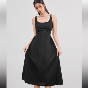 Black low cut high waisted pleated maxi dress